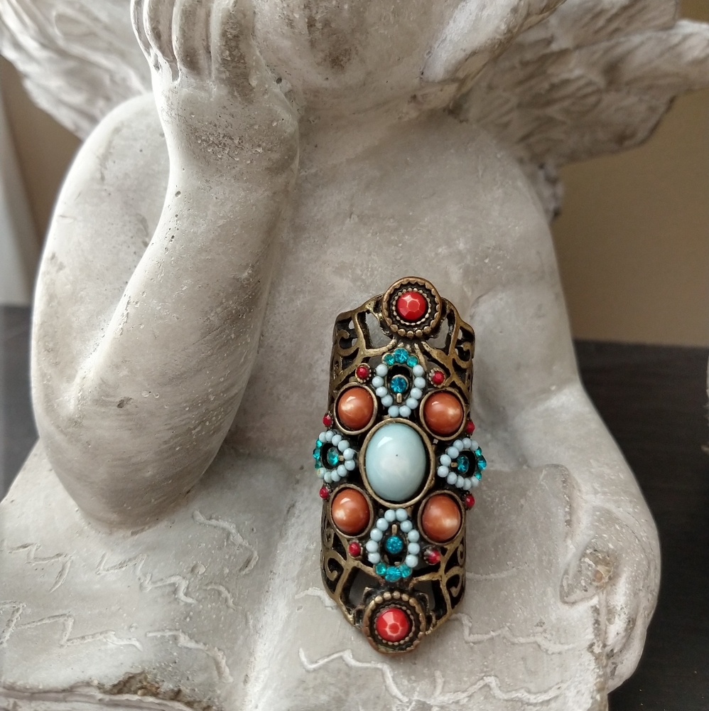 Bronze tribal type stone ring.